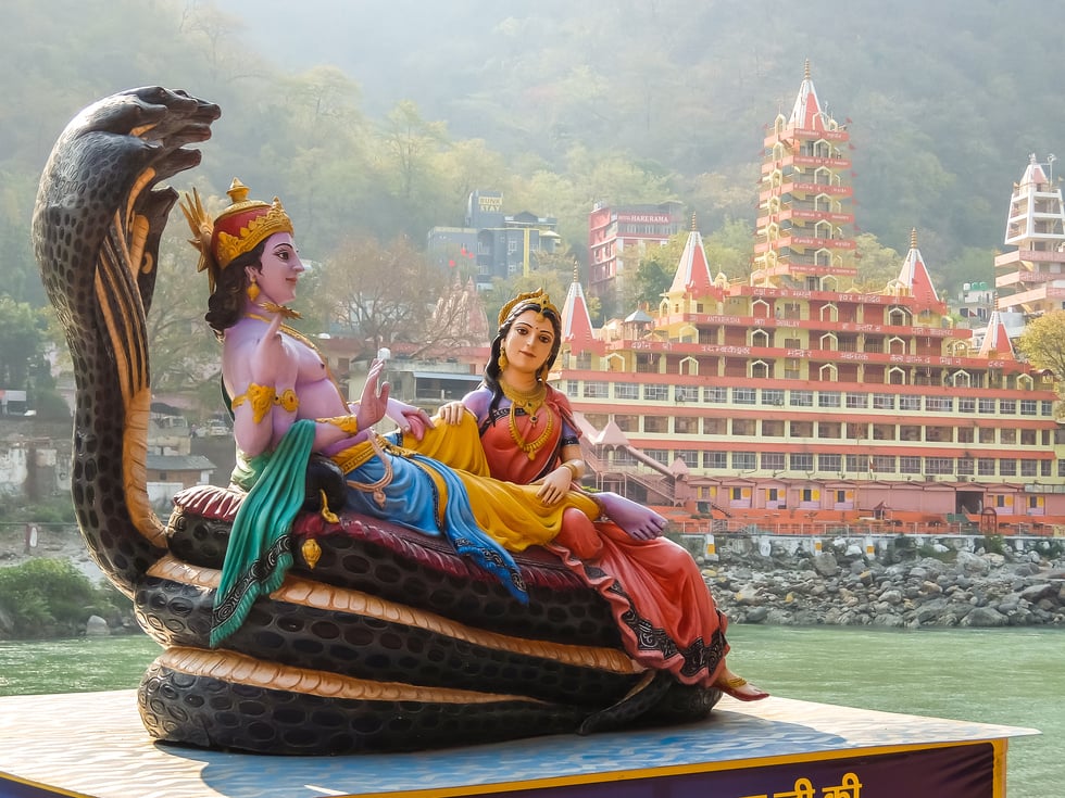 Beautiful statues of Lord Vishnu and Lakshmi at the Ganga riverbank in Rishikesh.